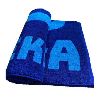 China Custom woven 100% cotton safe jacquard logo beach kids bath towel for sale