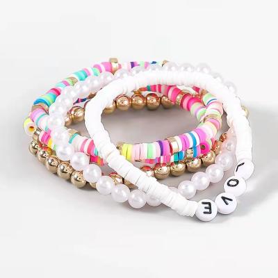 China TRENDY Polymer Clay Letters LOVE 5 Piece Beach Bracelet with Elegant Handwoven Bohemian Style for sale