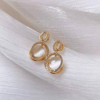 China Silver CLASSIC 925 Needle Solid Geometry Cat Eye Earrings for sale