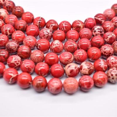 China Trendy Makers Charm Imperial Jasper Beads Sea Sediment Jewelry Seamless Round Impression Gemstone Making for sale