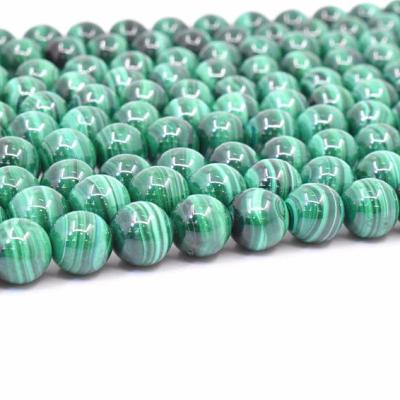 China Natural Gemstone Loose Beads Wholesale Charm Gemstone Cut Quality Natural Smooth Malachite Stone Round Loose Beads For Making Jewelry for sale