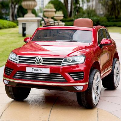 China Ride On Toy Ride On VW Touareg Toy Cars 12v Battery Power For Kids For Sale Electric Suv Vehicles With Wheels Suspension for sale