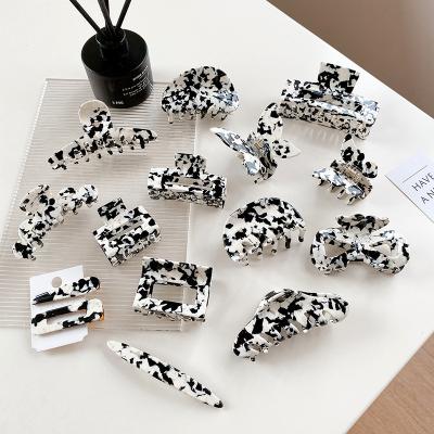 China 2020 New Eco-Friendly Style Acetate Hair Clips Hair Accessories Cow Color Series Set Black And White Color Hair Claws Claw Clips For Women for sale