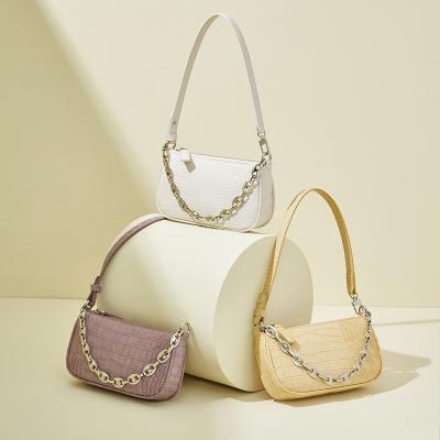 China Purple PU Crocodile Shoulder Bag Summer Niche Design High-end Chain PU Armpit Bag for sale