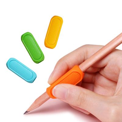 China Children pose correction aid tool home schooling and preschool silicone writing tools for kids pencil tweezers for sale