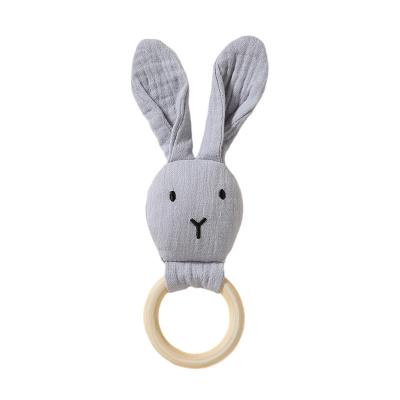 China Baby Soft Rattle Rabbit Cotton Fabric High Quality Wooden Ring for sale