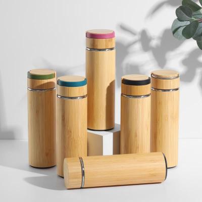 China 500ml Reusable Metal Double Wall Water Bottle Insulation Business Vacuum Bamboo Lid for sale