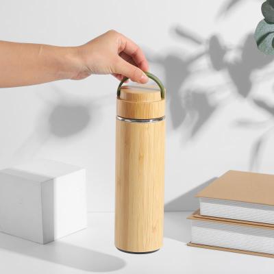 China Business factory customer direct logo 18/8 stainless steel water bottle natural material bamboo for sale