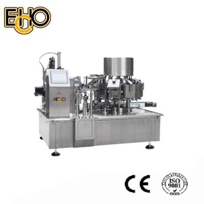 China Beverage Food Automatic Rotary Vacuum Sealer Packing Machine for sale