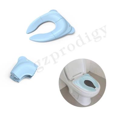 China Compact Size Easy Carry Baby Potty Training Seat Foldable Potty Seat Cover zu verkaufen