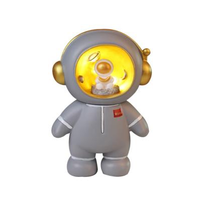 China Ceramic Wholesale Light Led Astronaut Astronaut Light Piggy Bank Usb Night Lamp for sale