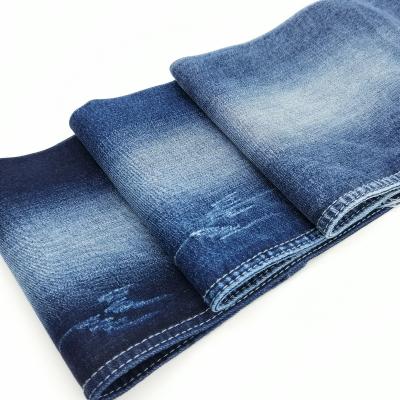 China China factory high elastic breathable 12.8 oz blue soft jeans fabric stock for high fashion garments for sale