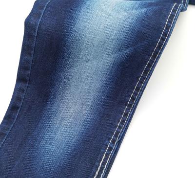 China Breathable New Style Small Stretch Twill Weave Denim Fabric Stock For Men Jeans for sale