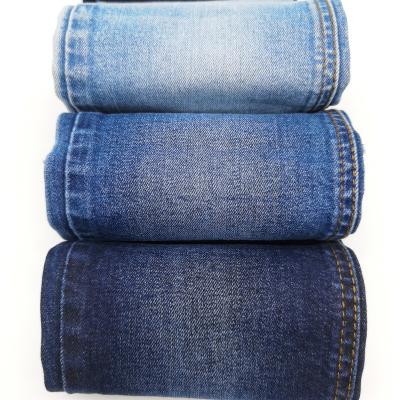 China Hot Selling Big Brand Stretch Twill Textile Textile Denim Fabric Breathable Stock Lot Made In China for sale