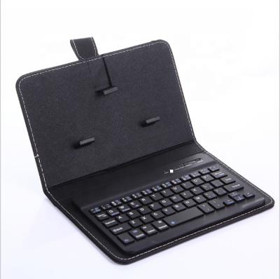 China Android leather 4.5-6.8 inch mobile phone keypad tooth cover device blue wireless phone case keyboard for sale