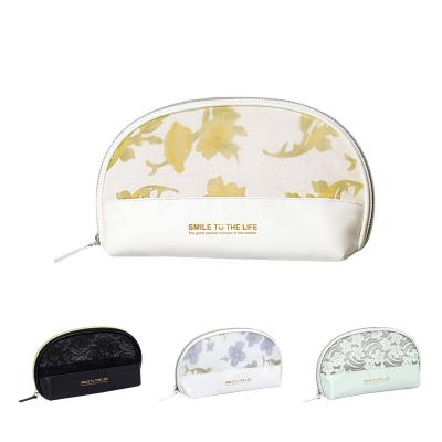 China Fashion factory direct printing cylinder retro makeup portable travel wash bag for sale