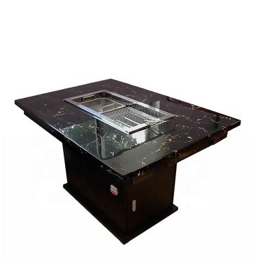 China Customizable Yawei commercial cooking and rinsing hot pot table marble table top barbecue grill table for sale