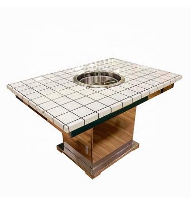 China Customizable commercial Yawei hot pot table under the smoke exhaust restaurant marble hot pot table for sale