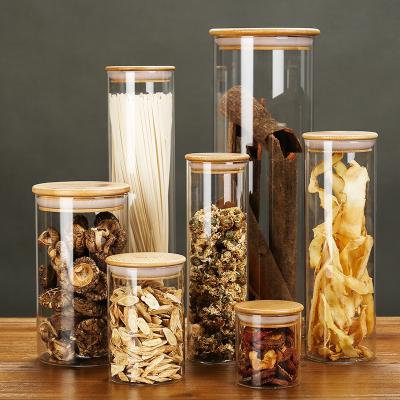 China Freshness Preservation Supplier Borosilicate Empty Round Glass Airtight Kitchen Food Cookies Storage Bottles And Jars With Bamboo Lid for sale