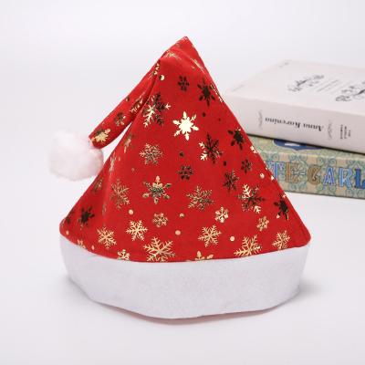 China Nonwoven Flannel Santa Flannel Christmas Hat Adult Snowflake Star Pattern Christmas Hat for sale