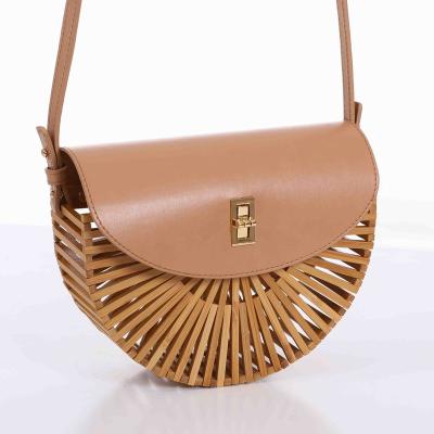 China Eco-Friendly Bamboo Handmade Semicircular Bamboo Clutch Bag with Leather Flap for sale