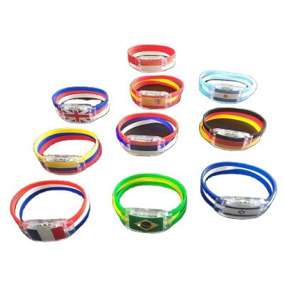 China 2022 National Supporter WC Soccer Fan Country Flag Silicone Led Light Glow Bracelet Led for sale