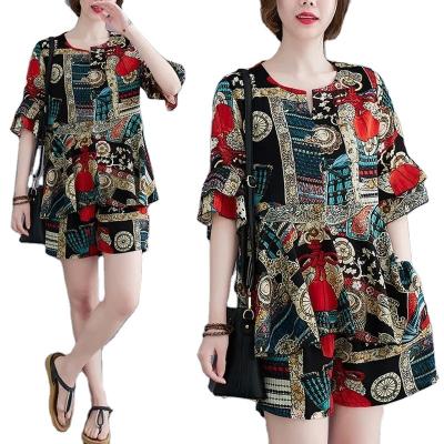 China Anti-pilling Spot wholesale Women 2022 summer new temperament thin chiffon print large size two-piece set for sale