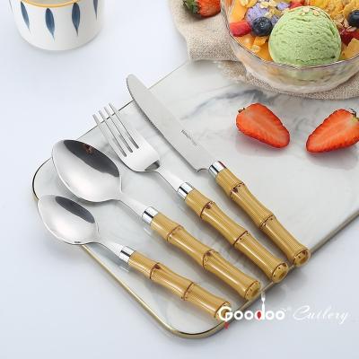 China Viable Fancy Design Stainless Steel Bamboo Flat Handle Dinnerware Wooden Plastic Handle Cutlery Set for sale