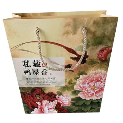 China Various Durable Wholesale Cheap Custom Printed Retail Paper Shopping Bags for sale