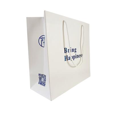 China Recyclable Paper Packaging Bags Luxury Fashion Custom Design Logo Printing Wholesale Shopping Packaging Eco Friendly for sale