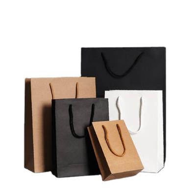 China 2022 Recycled Materials Factory Customized Kraft Paper Bags With Your Own Personal Logo Shopping Gift Paper Bags for sale