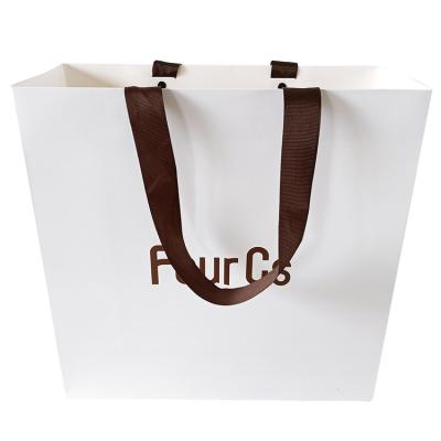 China Luxury Custom Clean Recyclable White Logo Printed Paper Bag Custom Paper Shopping Bag Retail Clothing Packaging For Clothing for sale