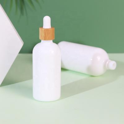 China Wholesale cosmetic oil cosmetic packaging essential oil bottle 100ml custom white china bottle for sale