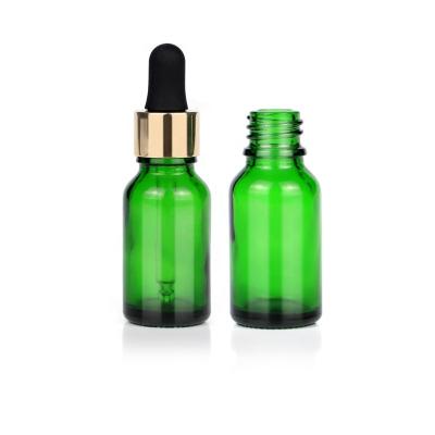 China 15ml Cosmetic Essential Oil Bottles High Quality Green Glass Bottle With Aluminum Dropper Cap for sale