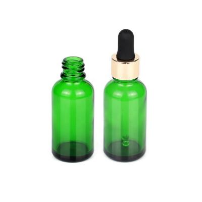 China Hot Selling 30ml Cosmetic Essential Oil Green Glass Bottles With Aluminum Dropper Cap for sale