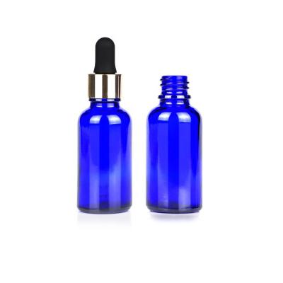 China Custom Color Cosmetic Custom Color Dropper Bottle 30ml Blue Glass Essential Oil Bottle With Aluminum Dropper Cap for sale