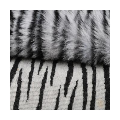 China Manufacturer Factory Supply Luxury Cheap 100% Polyester Plush Flame Retardant Fabric For Clothing for sale