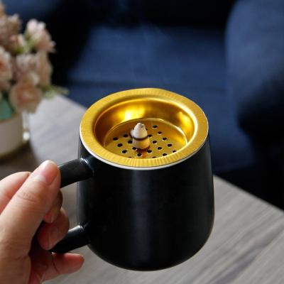 China Simple Modern Creative Black Matte Censer Incense Burner Incense Burner Arab Indian Middle East Ramadan Hand Held Ceramic Censer for sale