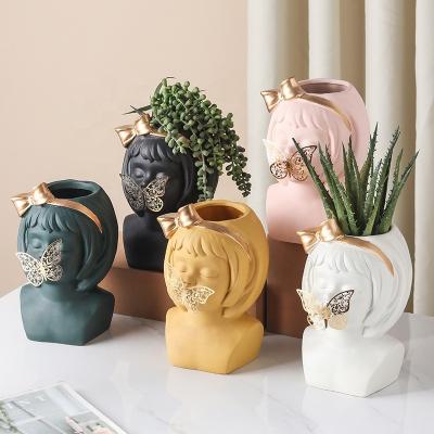 China Simply Nordic creative ceramic plump girl flowerpot living room Central Institute of Statistics vase decoration props for sale