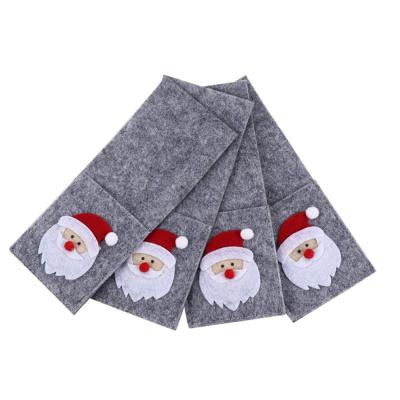 China Eco Friendly Christmas Cutlery Holder Bags Santa Claus Pattern Felt Rectangle Cutlery Bags Christmas Table Decoration Pack of 4 for sale