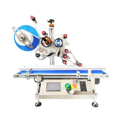 China Flat Label Or Dry Film Promotion Sticking Round Bottle Pouch Labeling Labeling Machine For Cosmetic for sale