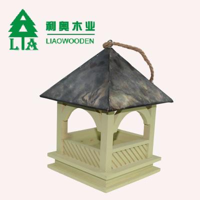 China Viable Wooden Plant Artificial Wood Carved Creative Wooden Bird House for sale