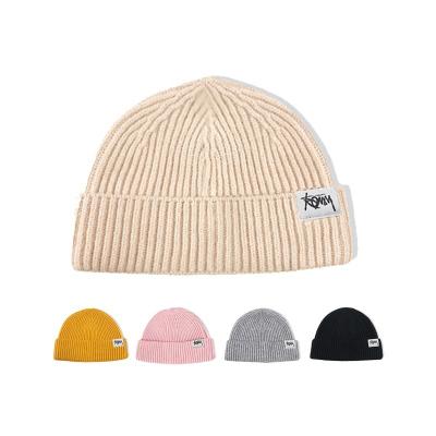 China COMMON Custom Unisex Skullcap Hat Long Ribbed Plain Knitted Custom Skullcap Acrylic Guffed Skullcap for sale