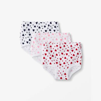 China Breathable Wholesale Breathable Comfortable Organic Cotton Heart Shape Print Seamless Girl Children's Underwear for sale