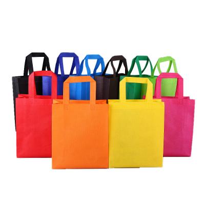 China Eco-friendly Wholesale Nonwoven Nonwoven Fabric Bottle T-shirt Shopping Bag T-shirt Bag With Low Price / Disposable Printing Nonwoven Bag for sale