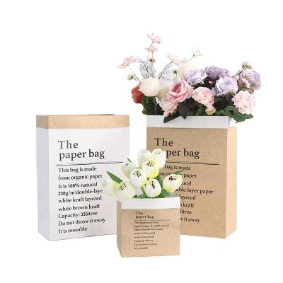 China New Design Florist Handmade Materials Portable Flower Paper Bag Valentine's Day Flowers Packaging Bag Bouquet Flower Handbag for sale