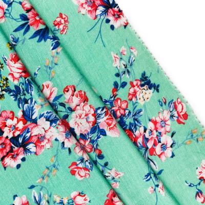 China Viable Wholesale Cheap Floral Printed Fabrics Rayon Squishy Ring Spun Jersey Knitting Textiles For Dress for sale