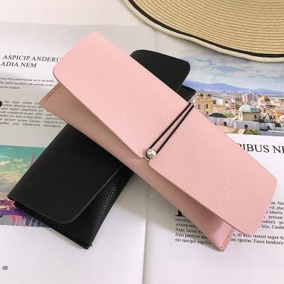 China Fashionable portable durable soft cortex temperament glass case bag tie rope sunglasses case sunglasses leather case for sale