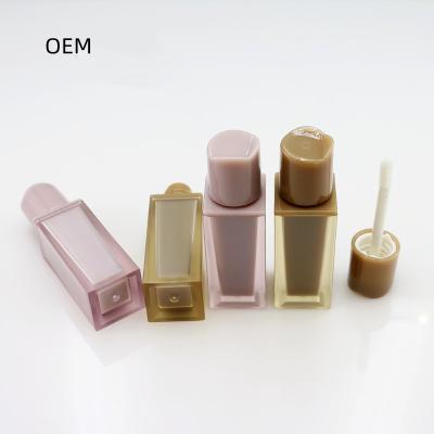 China 2.5ml Private Label Tube Lip Gloss Cosmetic Lip Gloss Containers Custom ABS Sandwich Trapezium Plastic Tube for sale