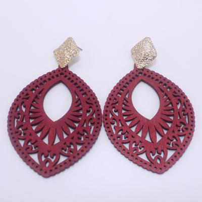 China Vintage Casual / Sporty Mysterious Oriental Wood Carved Alloy Earrings for sale